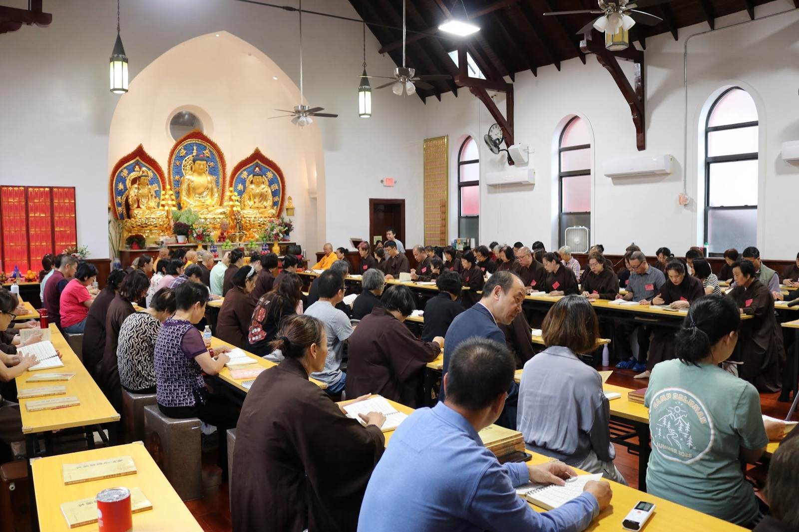 Practitioners filling the shrine hall during a ceremony